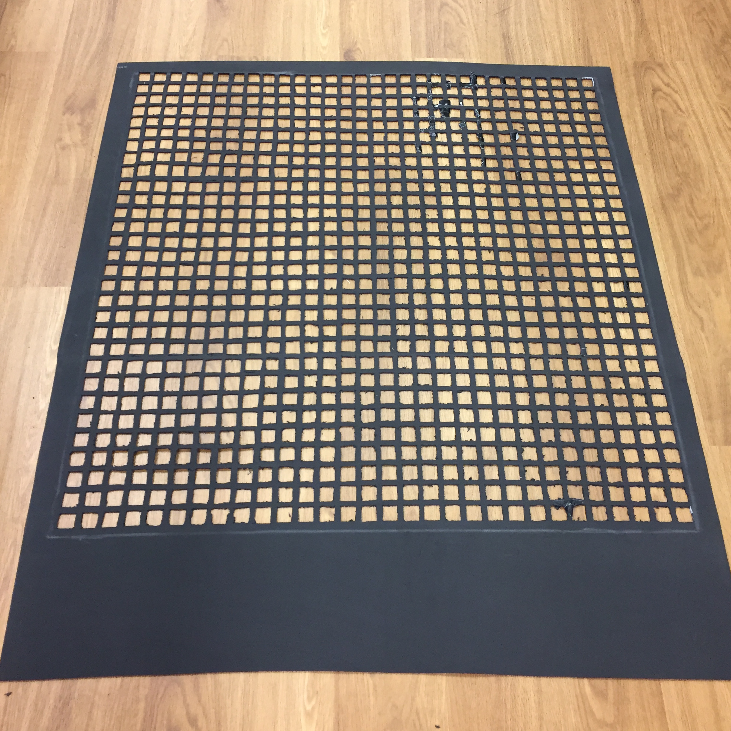 One meter by one meter with 30 by 30 grid made of about 1 inch holes