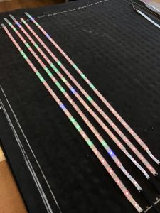 Pictured are 5 LED strips with various colors after having been turned on from their respective inputs -- Very exciting!
